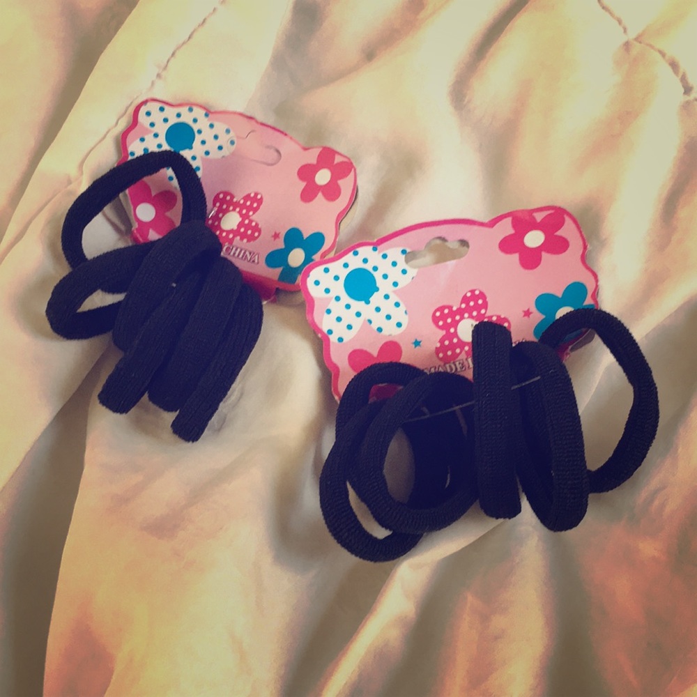 2 Sets of 6 hair ties, black. Sold together.